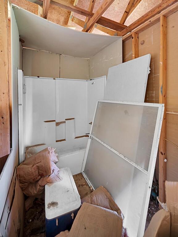 105 County Road 3590 China Spring, TX 76633 - Photo 20 of 30 a bathroom with a tub and shower