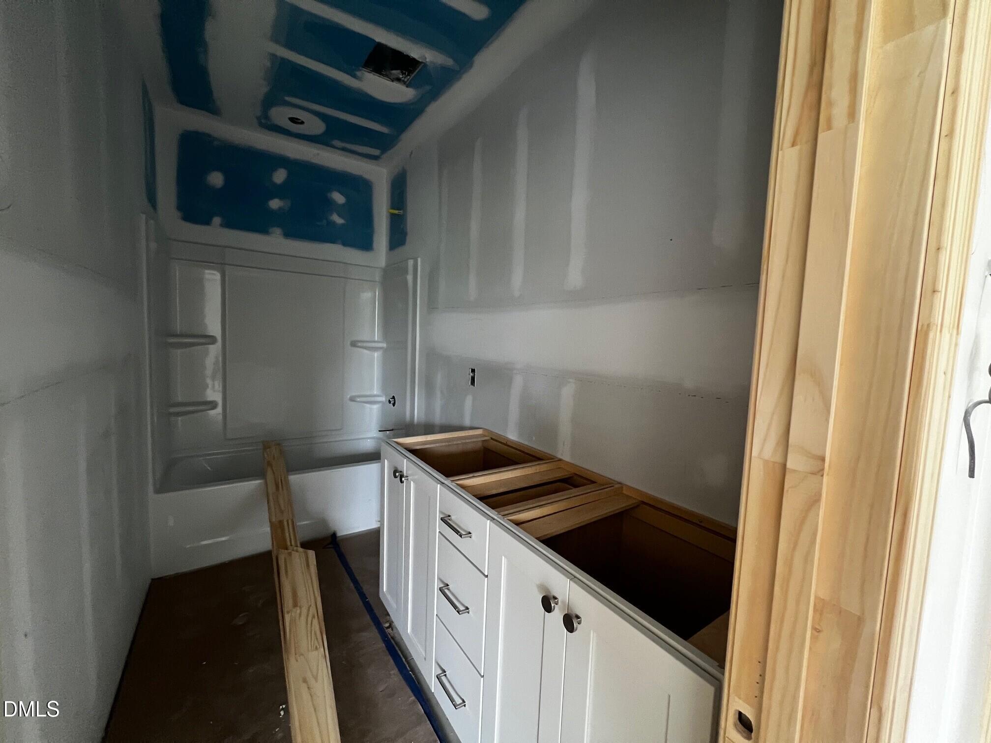 1675 Terry Road Durham, NC 27712 - Photo 13 of 23 a kitchen with a stove and a refrigerator