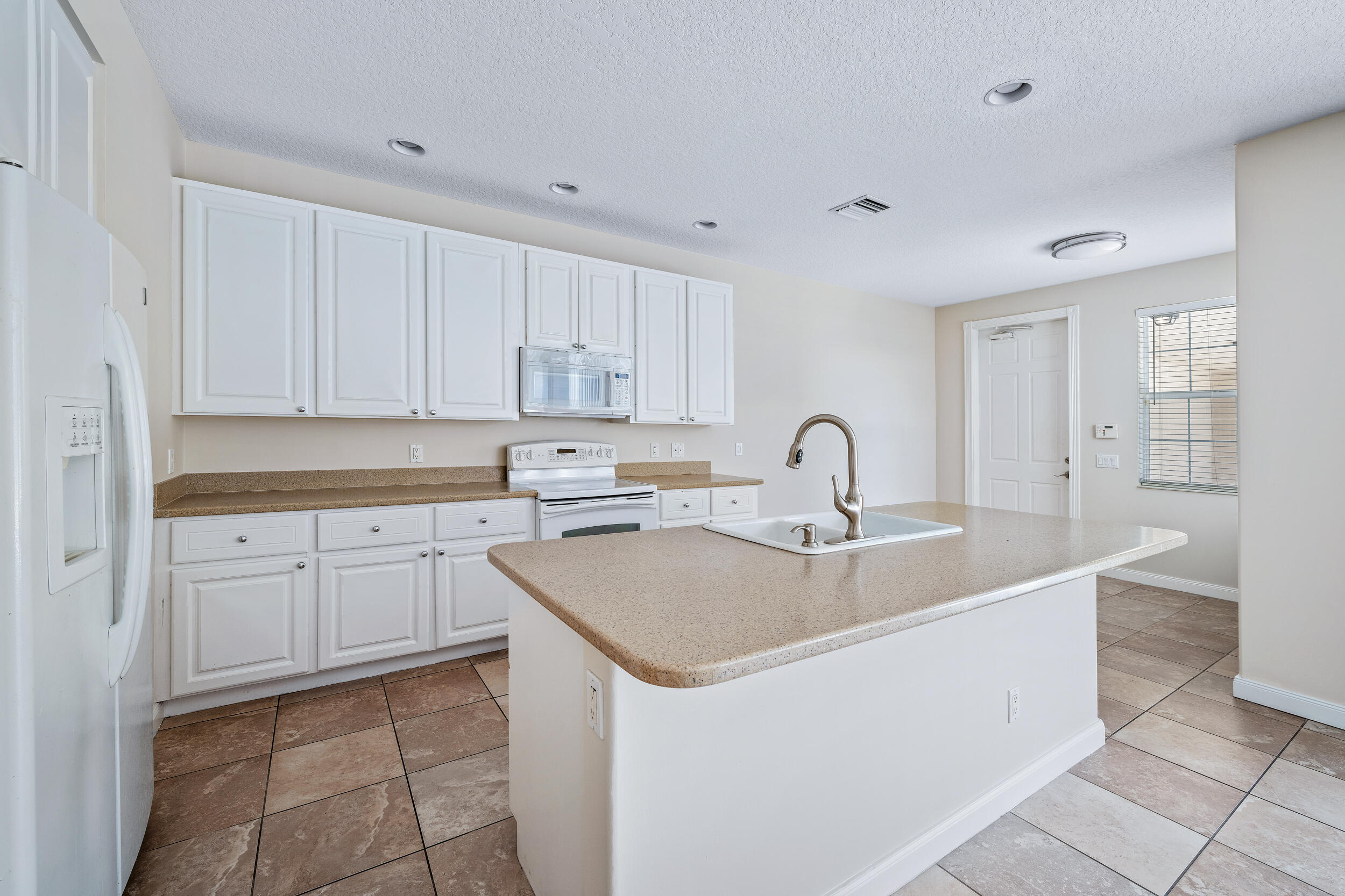 1809 Dakota Drive Jupiter, FL 33458 - Photo 10 of 25 OPEN KITCHEN