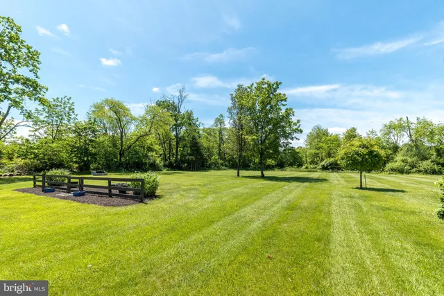 a view of a house with a big yard