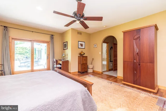 a spacious bathroom with a granite countertop tub and a sink