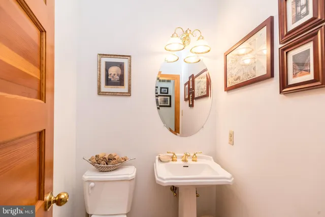 a view of a hallway with refrigerator