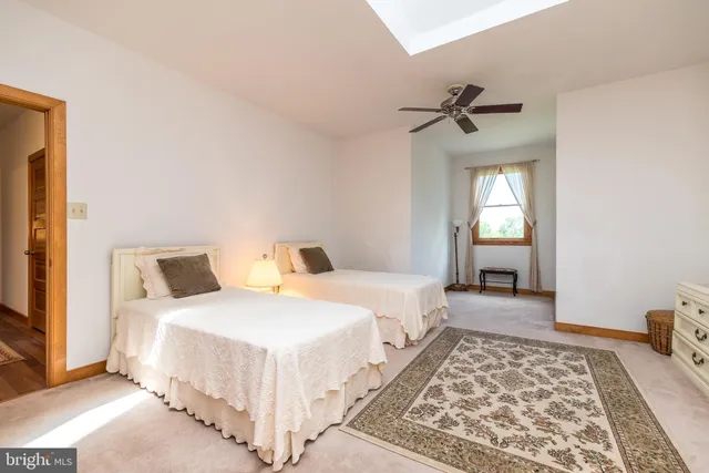 a view of an empty room with windows