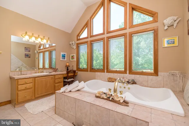 a view of a patio with table and chairs