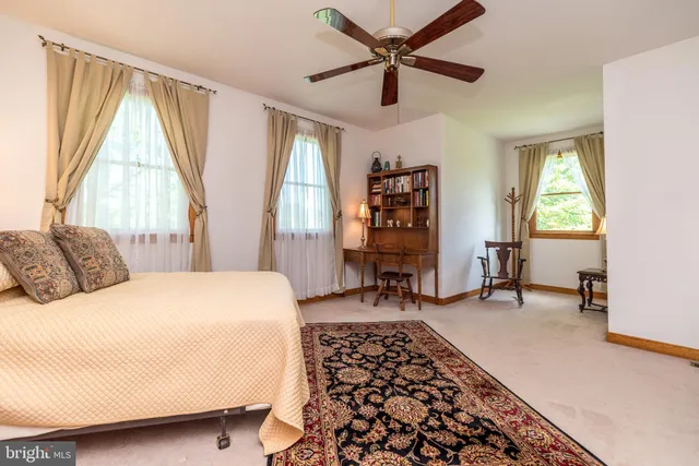 a backyard of a house with seating space