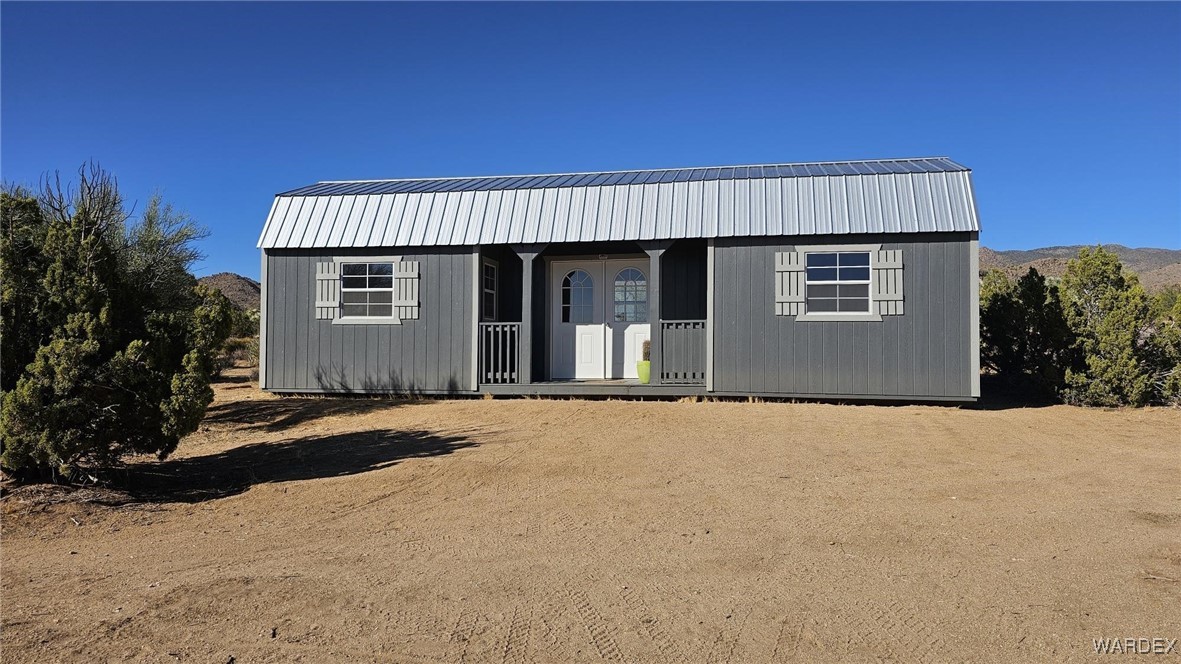 18680 Gunsmoke Road Yucca, AZ 86438 - Photo 1 of 31 Front of Structure