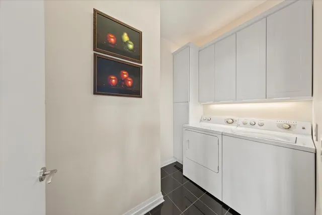 a kitchen with stainless steel appliances kitchen island granite countertop a refrigerator and a stove