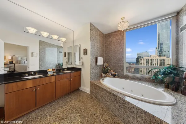 a room with pool table and flat screen tv