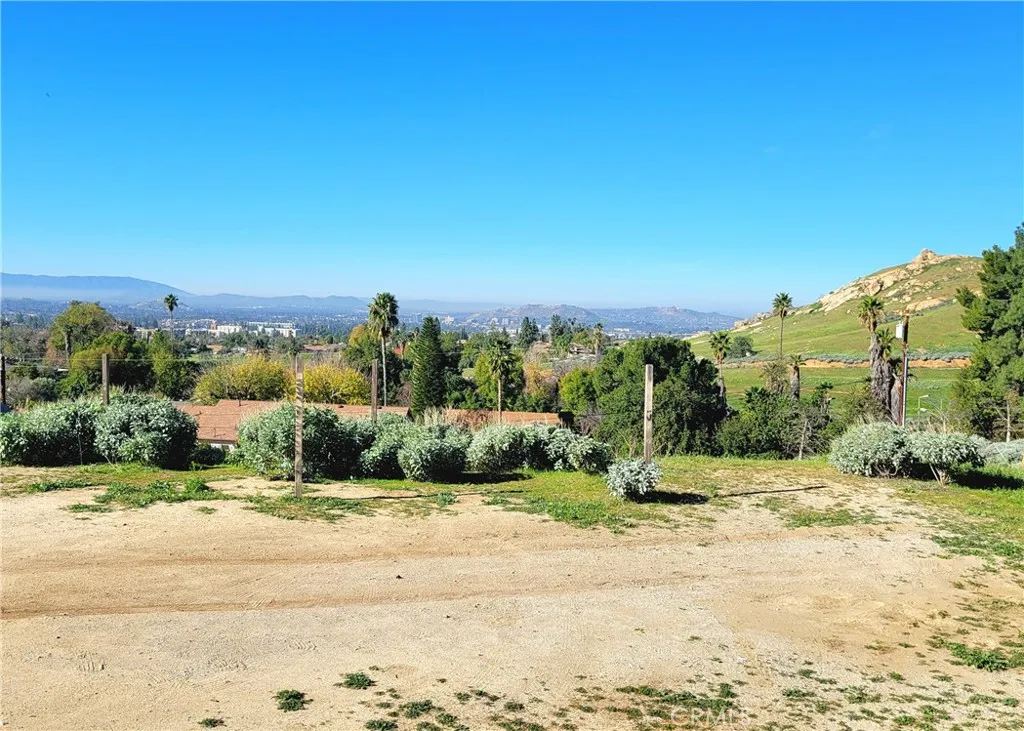 2935 Galaxie Road Riverside, CA 92507 - Photo 3 of 45 a view of a road with a building in the background