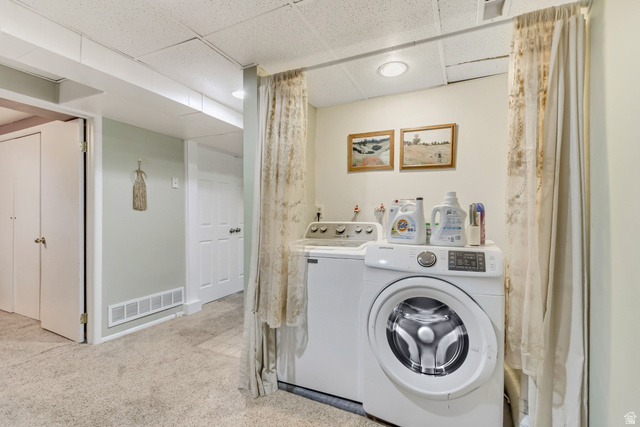 65 West 700 North Bountiful, UT 84010 - Photo 24 of 29 Dedicated laundry area featuring a front-loading washing machine, top-loading washing machine, and recessed lighting