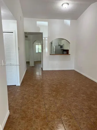 a view of a car garage with a sink
