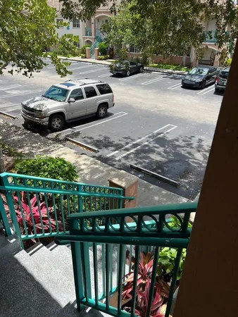 a view of street with parked cars