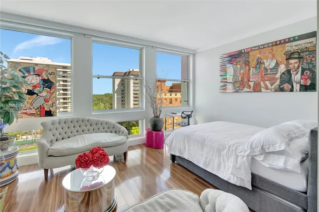 a bed room with a bed and a couch