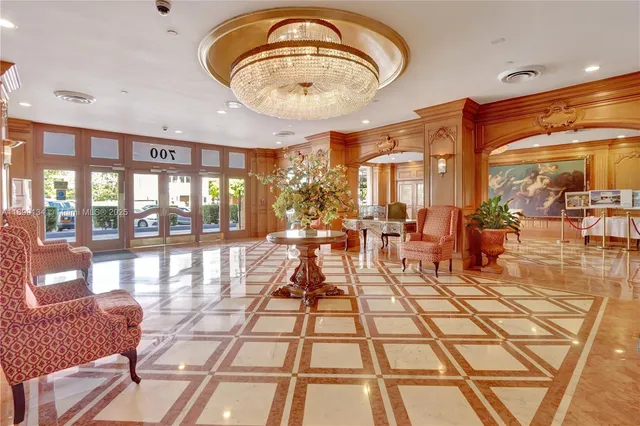 a view of a living room and dining room