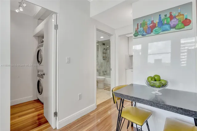 a view of a dining area with furniture and wooden floor