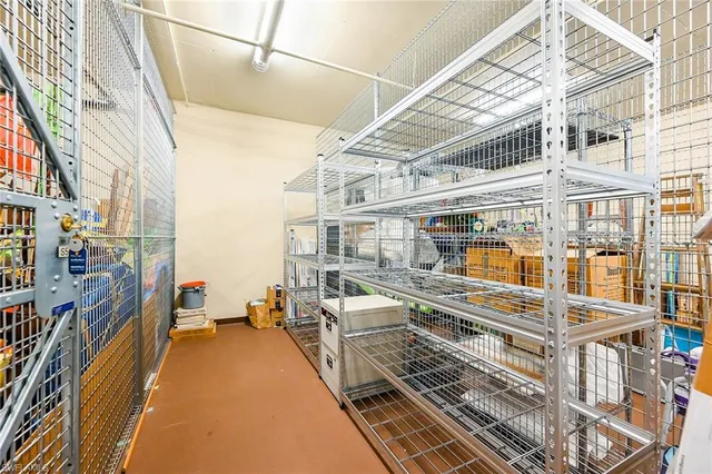 a view of a balcony with cars