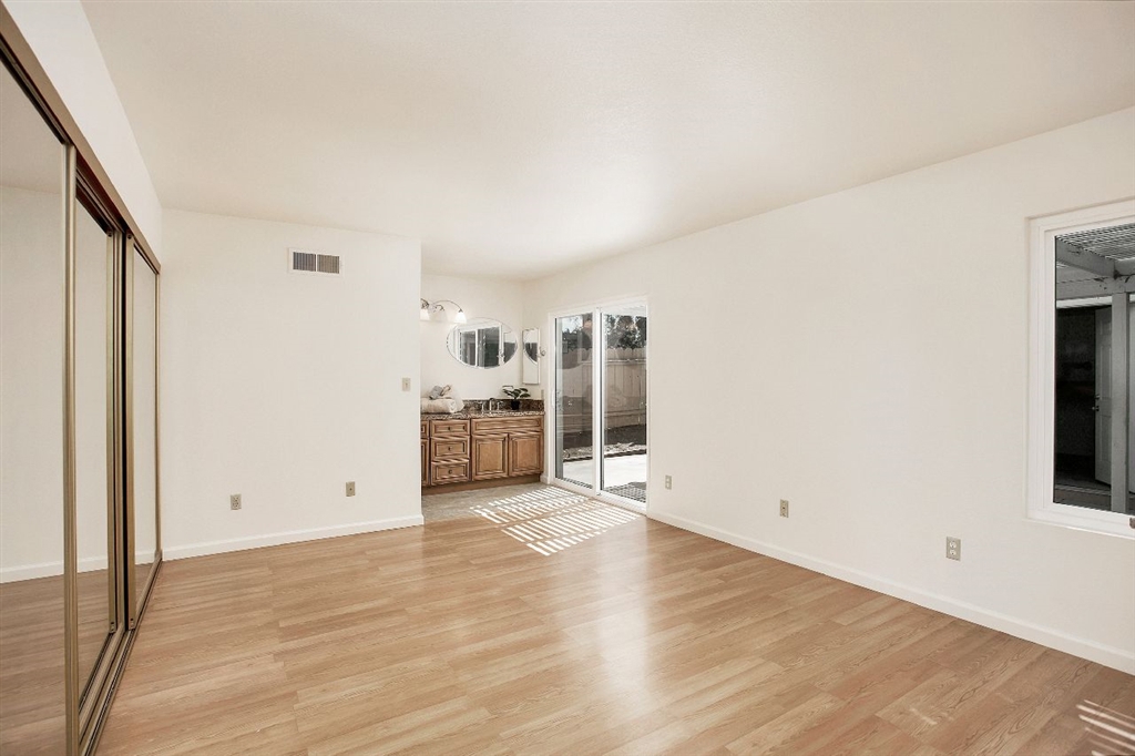 1980 Paseo Del Rey Vista, CA 92084 - Photo 11 of 25 a view of a kitchen with wooden floor