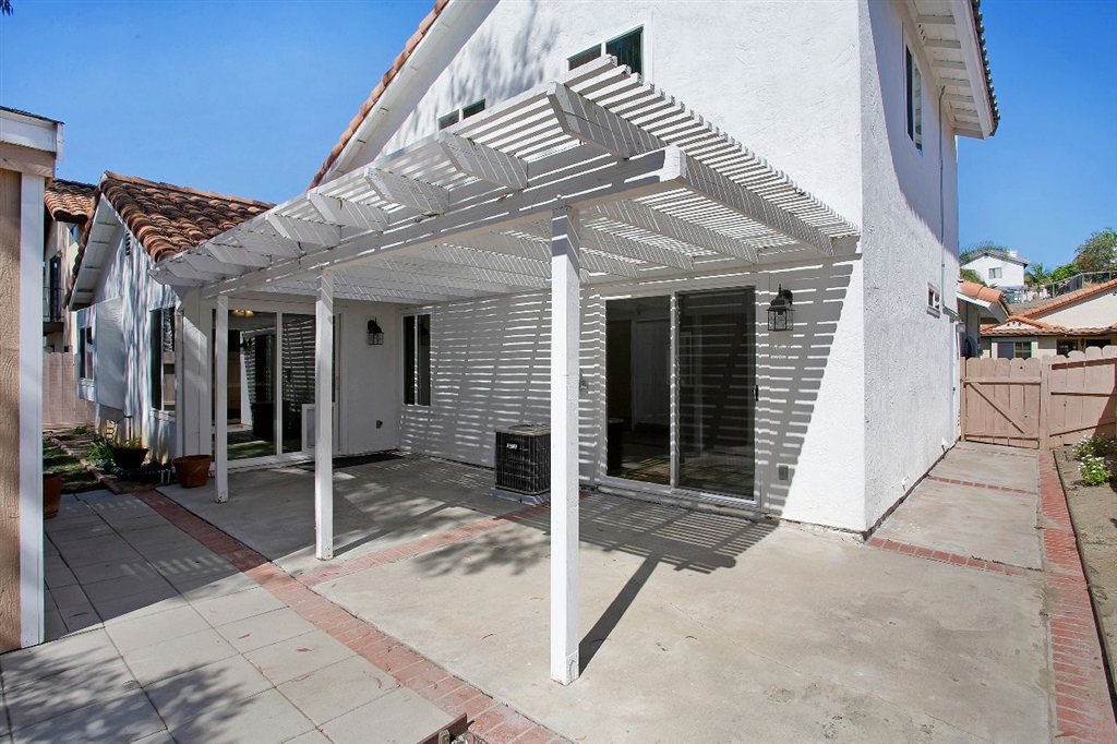 1980 Paseo Del Rey Vista, CA 92084 - Photo 20 of 25 a view of a house with a patio