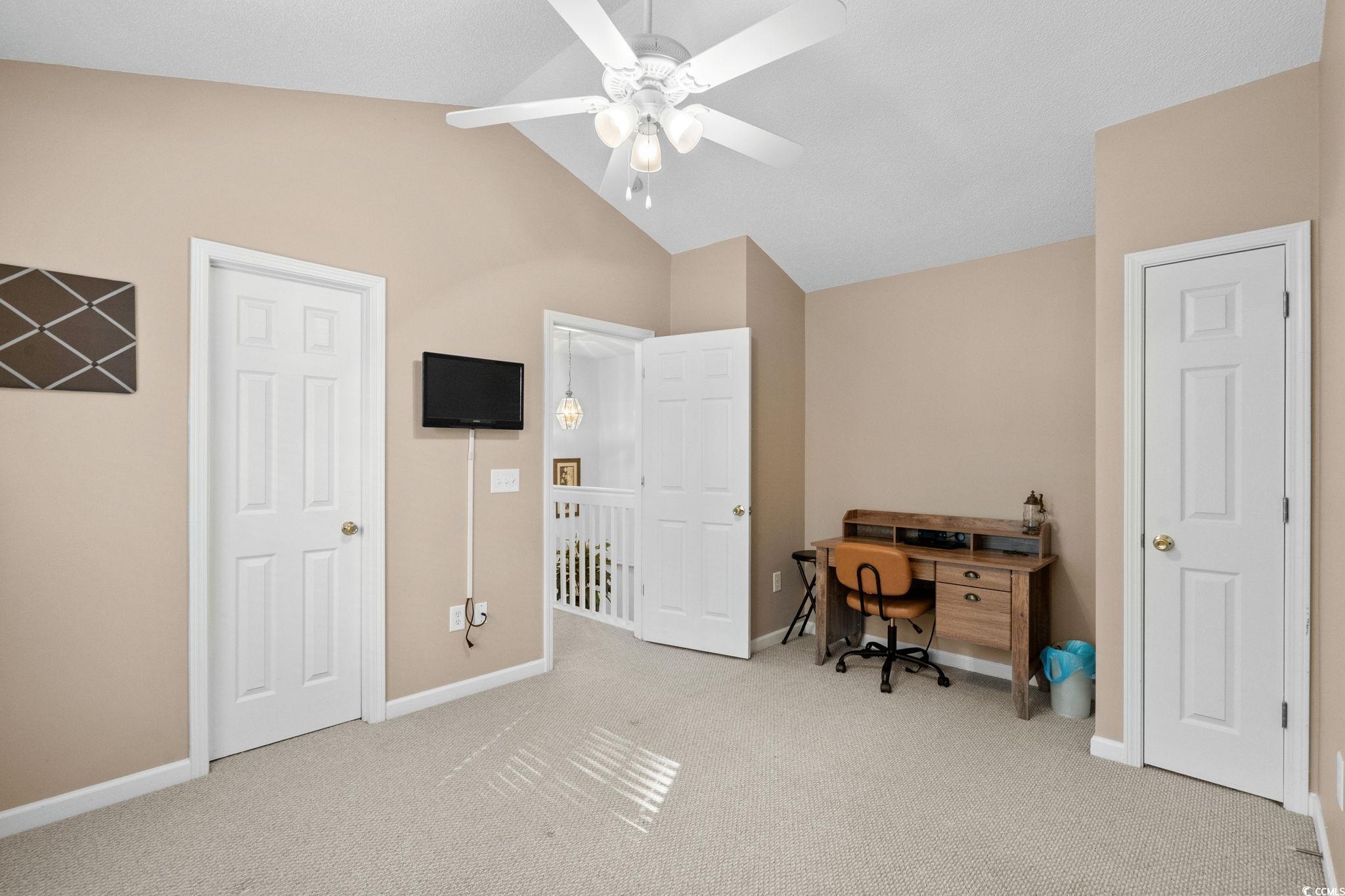 399 Seabert Road, Unit 209 Myrtle Beach, SC 29579 - Photo 30 of 40 Home office with lofted ceiling, light colored carpet, and a ceiling fan