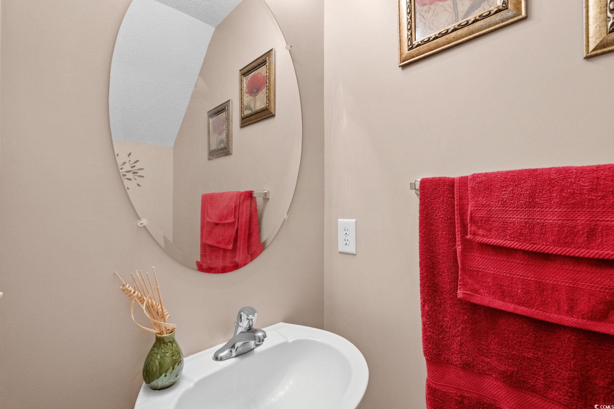 399 Seabert Road, Unit 209 Myrtle Beach, SC 29579 - Photo 33 of 40 Half bath featuring a sink