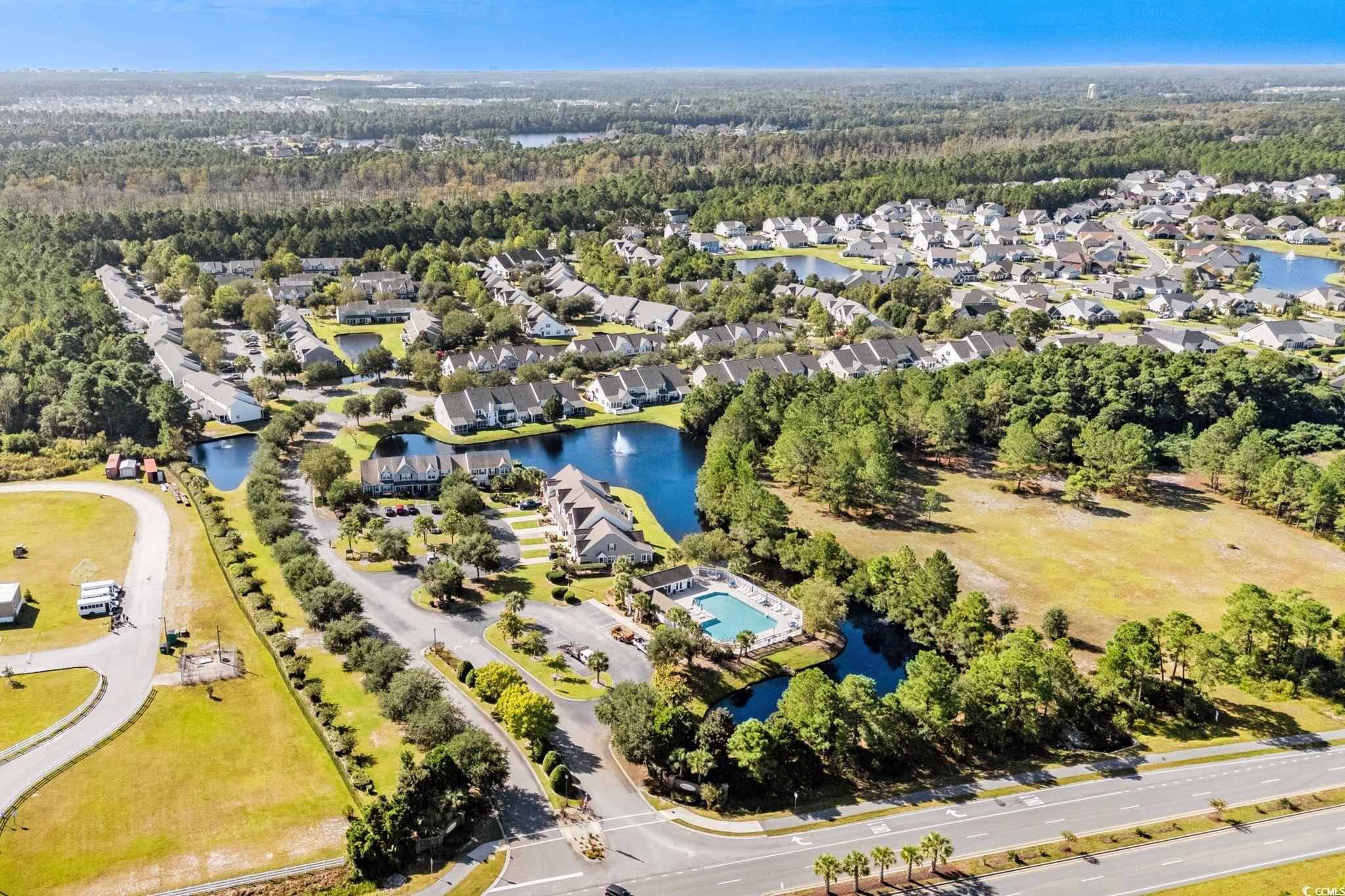 399 Seabert Road, Unit 209 Myrtle Beach, SC 29579 - Photo 40 of 40 Aerial perspective of suburban area with a large body of water