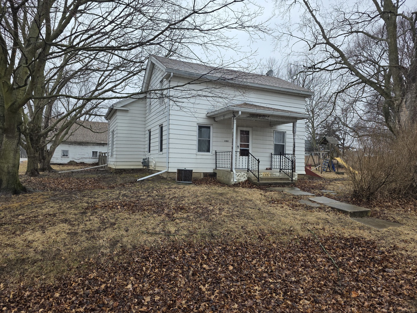 2203 Deets Road Sterling, IL 61081 - Photo 2 of 13 a view of house with a outdoor space