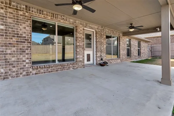a view of a building with a patio