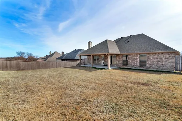 a house view with a garden space
