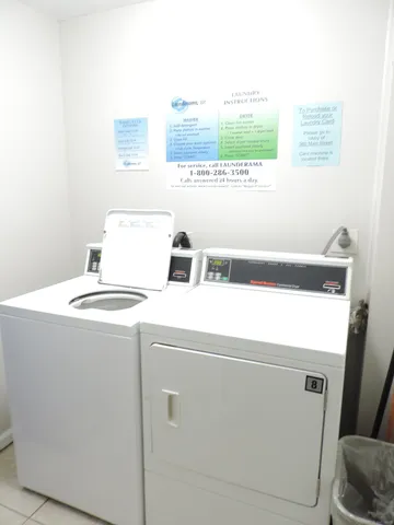 a view of front door of house with stairs