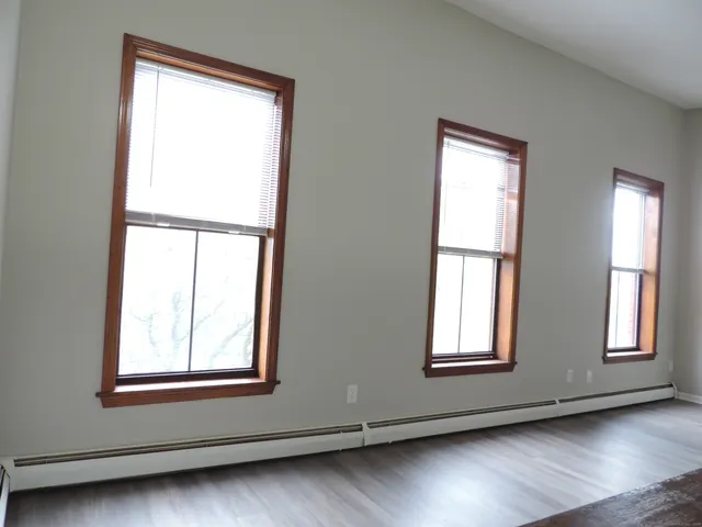 a kitchen with a sink and a refrigerator