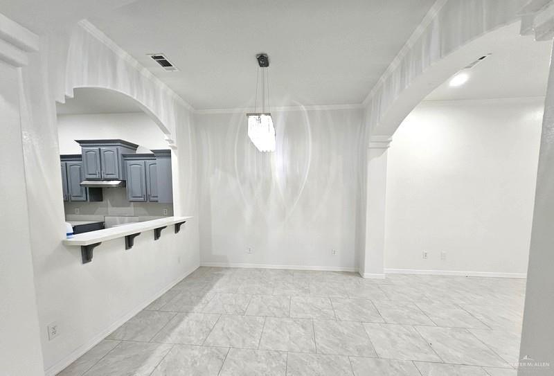 6720 North 4th Street McAllen, TX 78504 - Photo 5 of 25 a view of a kitchen with a sink and dishwasher in kitchen