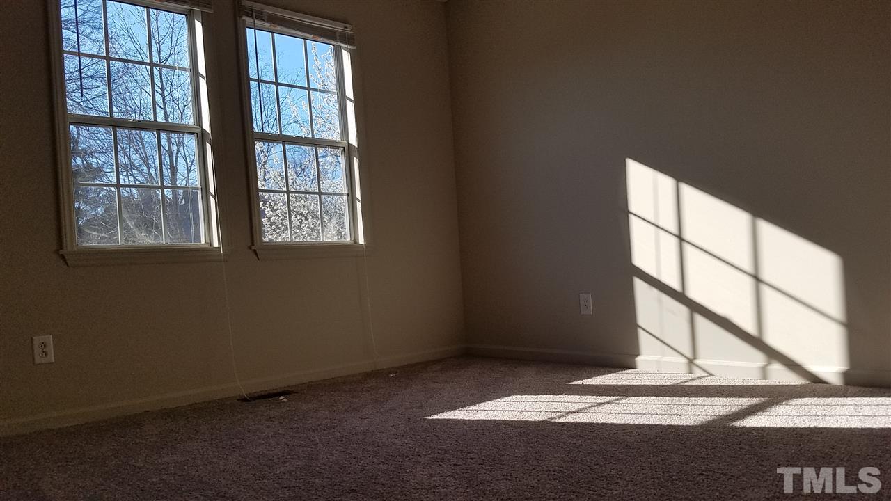4238 Kaplan Drive Raleigh, NC 27606 - Photo 13 of 21 a view of an empty room and a window