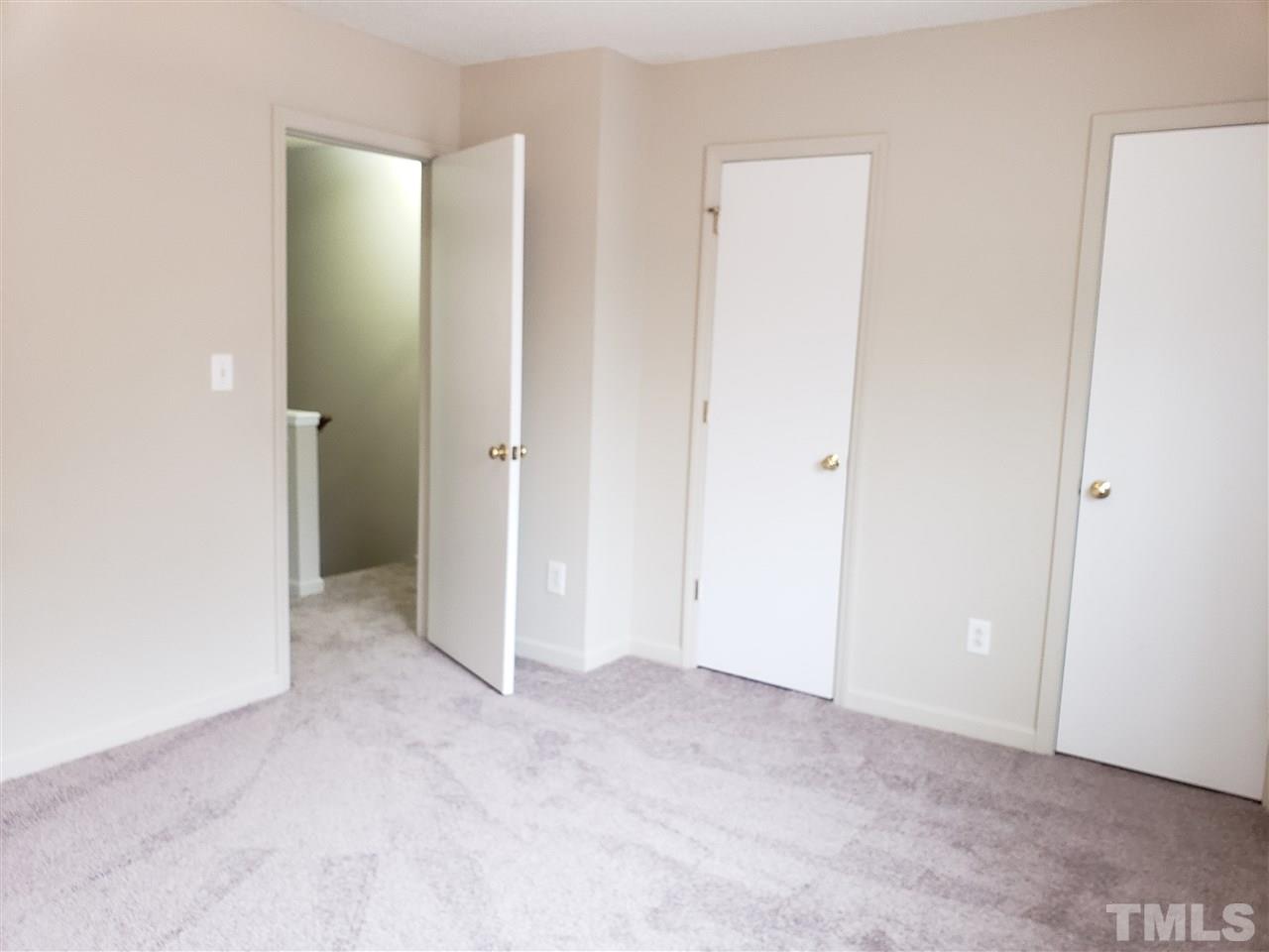 4238 Kaplan Drive Raleigh, NC 27606 - Photo 16 of 21 a view of an empty room with closet area