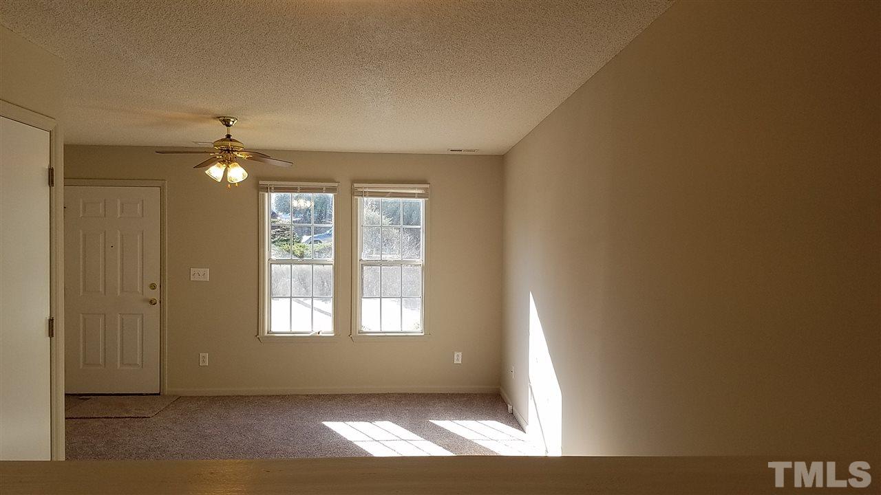 4238 Kaplan Drive Raleigh, NC 27606 - Photo 5 of 21 a view of an empty room with a window
