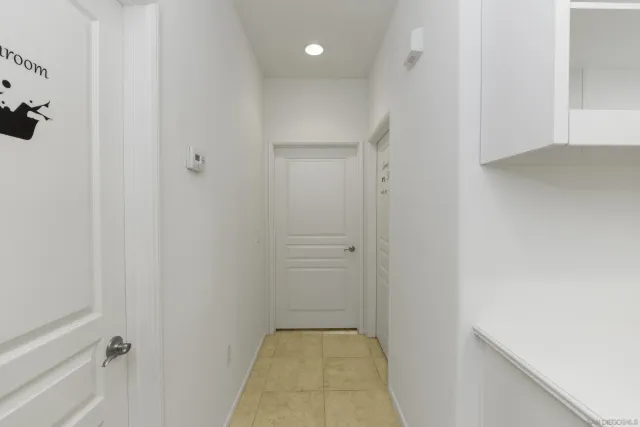 a view of empty room with windows