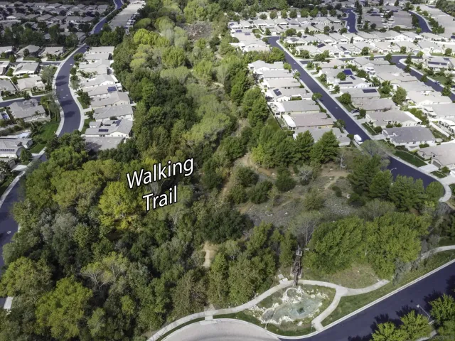 an aerial view of residential house with outdoor space