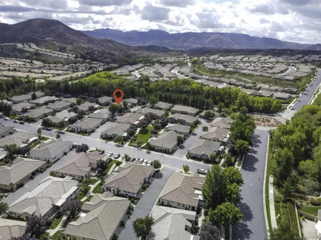 an aerial view of residential house with outdoor space