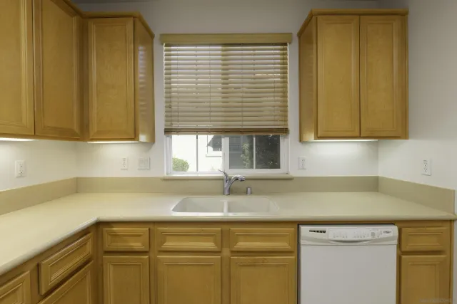 a bathroom with a sink vanity and mirror