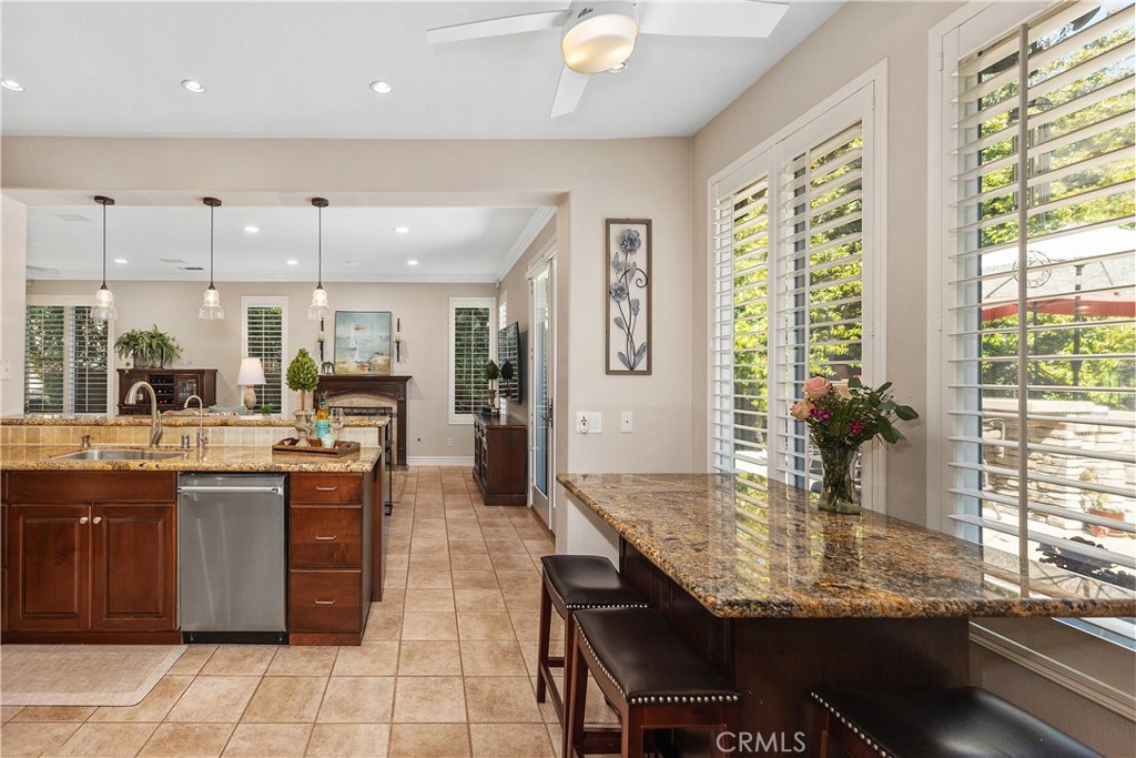 27 Hawk Hill Mission Viejo, CA 92692 - Photo 12 of 48 a kitchen with lots of counter top space and dining table