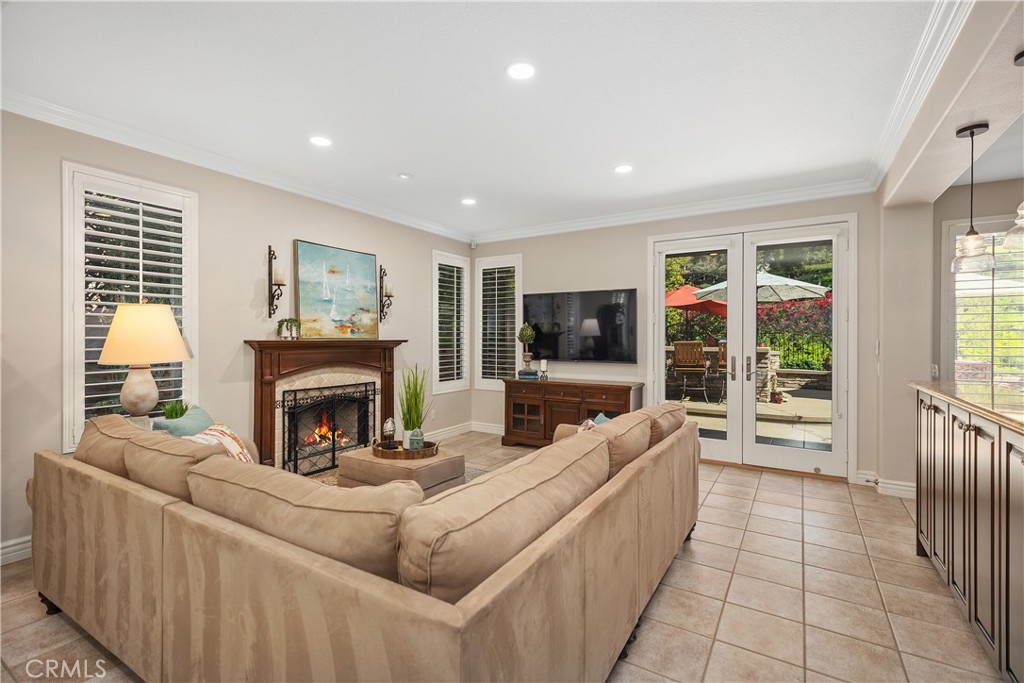 27 Hawk Hill Mission Viejo, CA 92692 - Photo 18 of 48 a living room with furniture and a fireplace