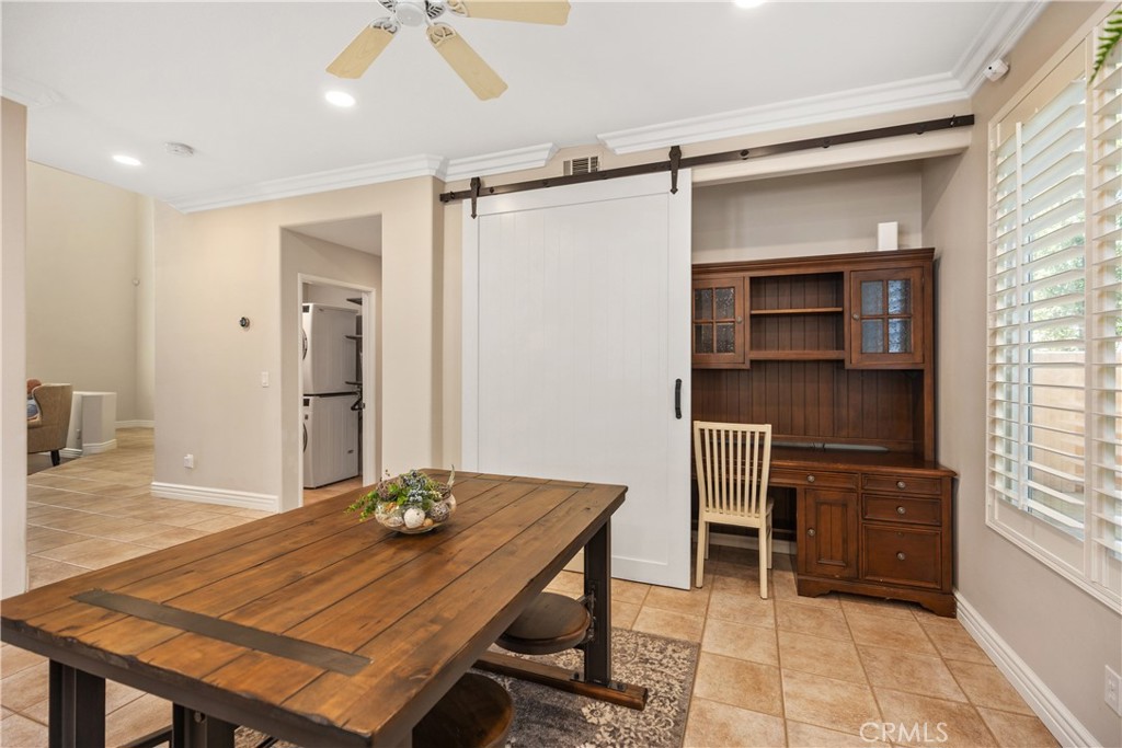 27 Hawk Hill Mission Viejo, CA 92692 - Photo 21 of 48 a view of a room that has a table and a chair in it