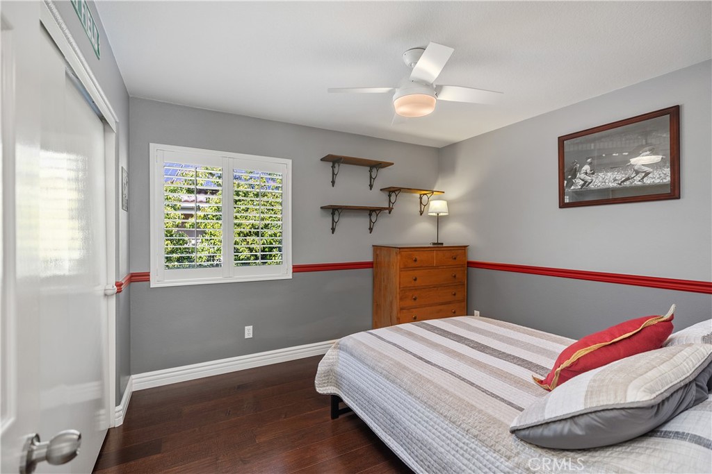 27 Hawk Hill Mission Viejo, CA 92692 - Photo 27 of 48 a bedroom with a bed and a painting on the wall