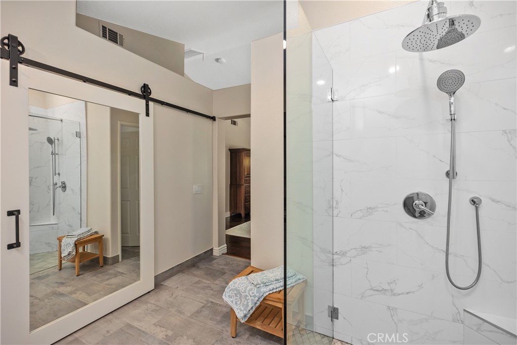 27 Hawk Hill Mission Viejo, CA 92692 - Photo 32 of 48 a bathroom with a shower and a mirror