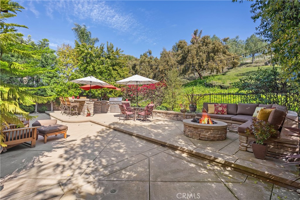 27 Hawk Hill Mission Viejo, CA 92692 - Photo 33 of 48 a view of a patio with furniture and a small yard