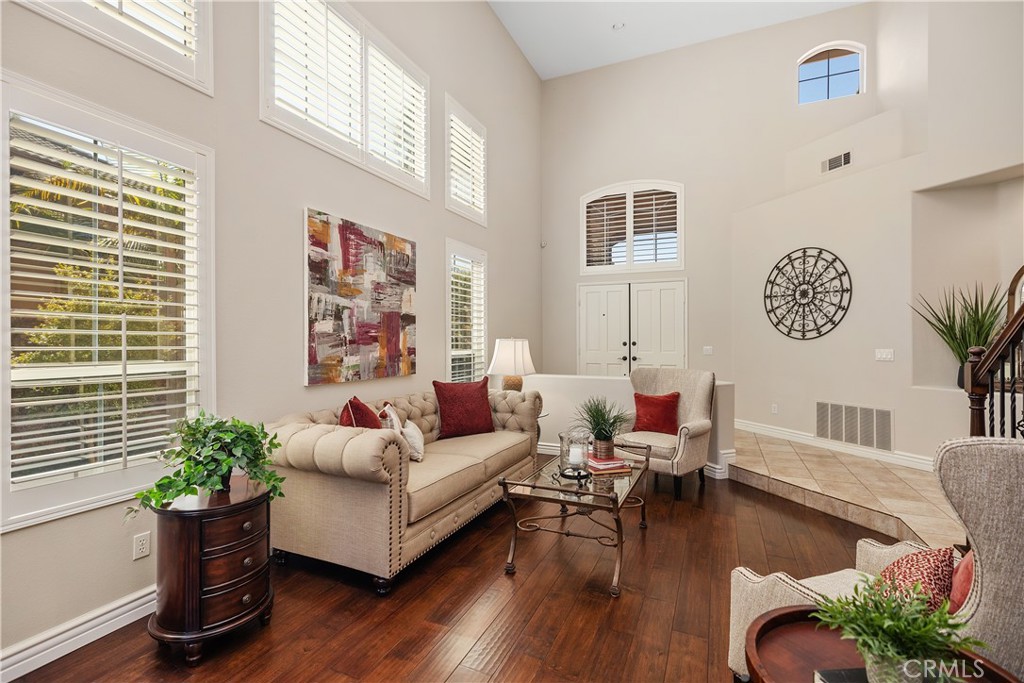 27 Hawk Hill Mission Viejo, CA 92692 - Photo 8 of 48 a living room with furniture potted plant and a window