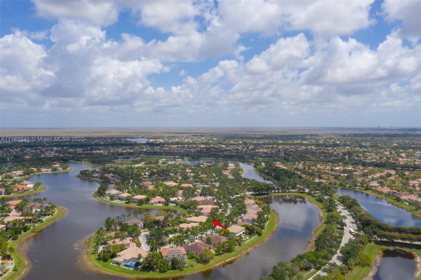 812 Regal Cove Road Weston, FL 33327 - Photo 20 of 64 an aerial view of residential houses with outdoor space