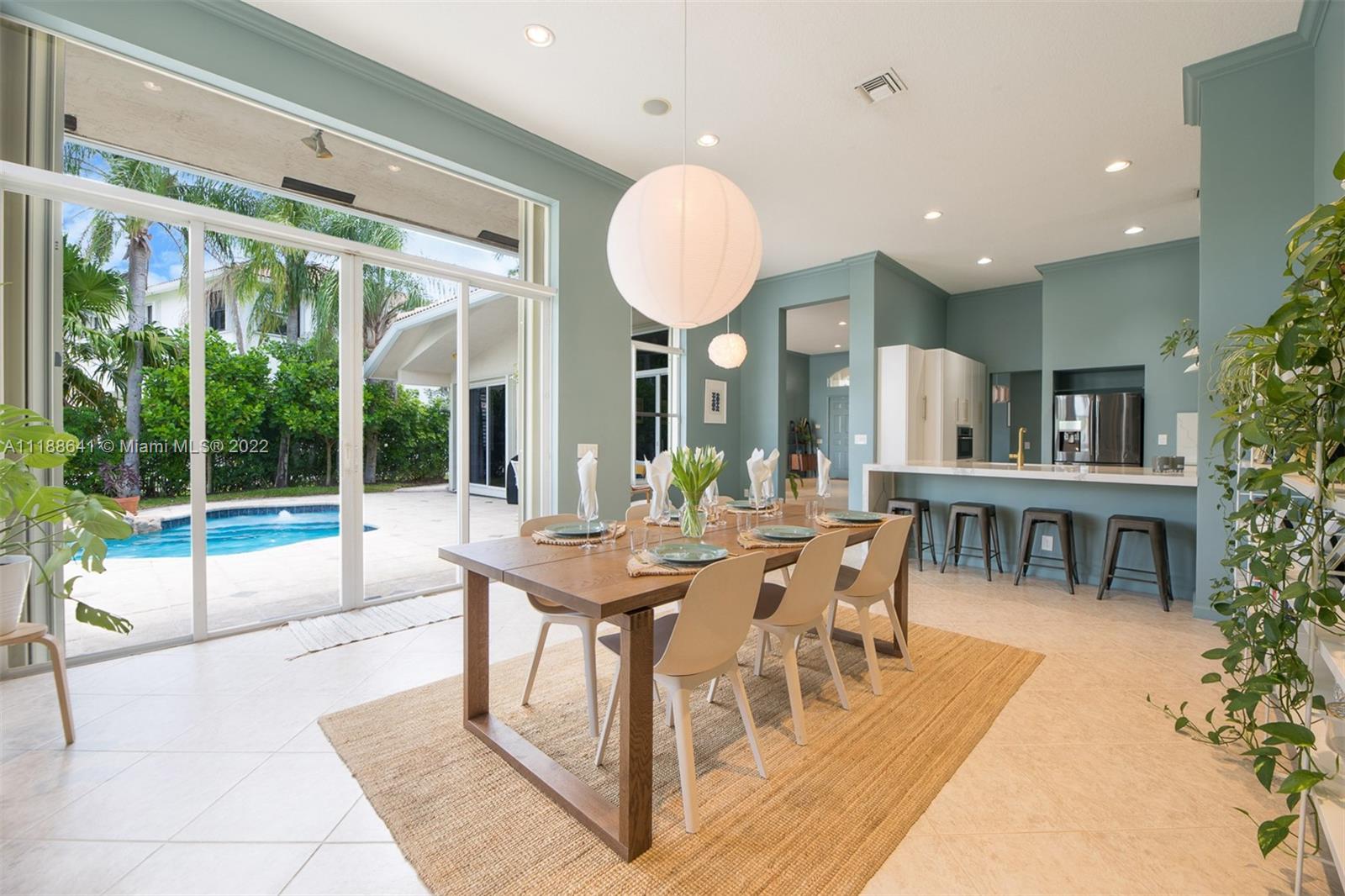 812 Regal Cove Road Weston, FL 33327 - Photo 42 of 64 a view of a dining room with furniture window and outside view