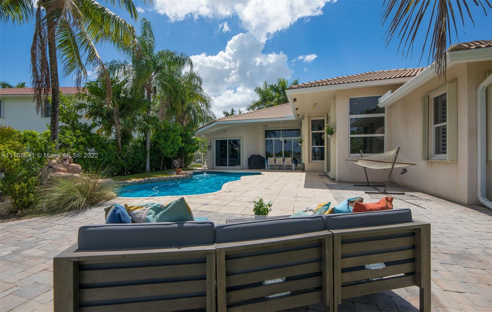 812 Regal Cove Road Weston, FL 33327 - Photo 5 of 64 a view of house with patio outdoor seating
