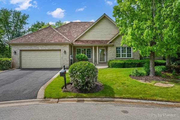 front view of a house and a yard