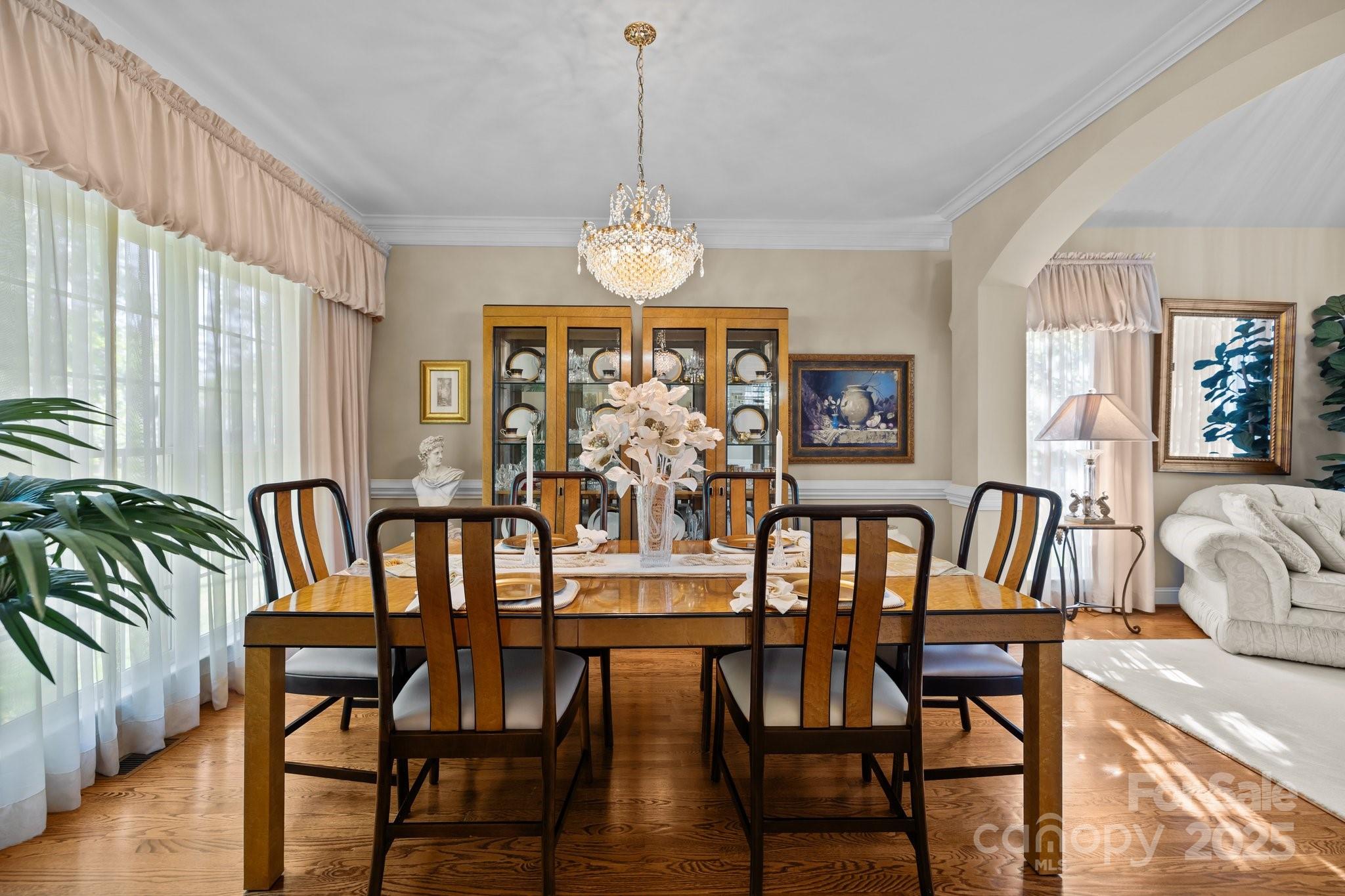 204 Limerick Drive Matthews, NC 28104 - Photo 12 of 44 a view of a dining room with furniture window and wooden floor
